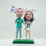 Benutzerdefiniertes Paar Bobblehead Golf spielt